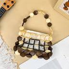 Aurelia – Perlmutt-Handtasche mit Holz-Akzenten