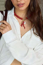 Alicante – Korallenrote Kette mit Barockperle