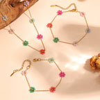 Jolie – Farbenfrohe Taillenkette mit Blumen-Akzenten