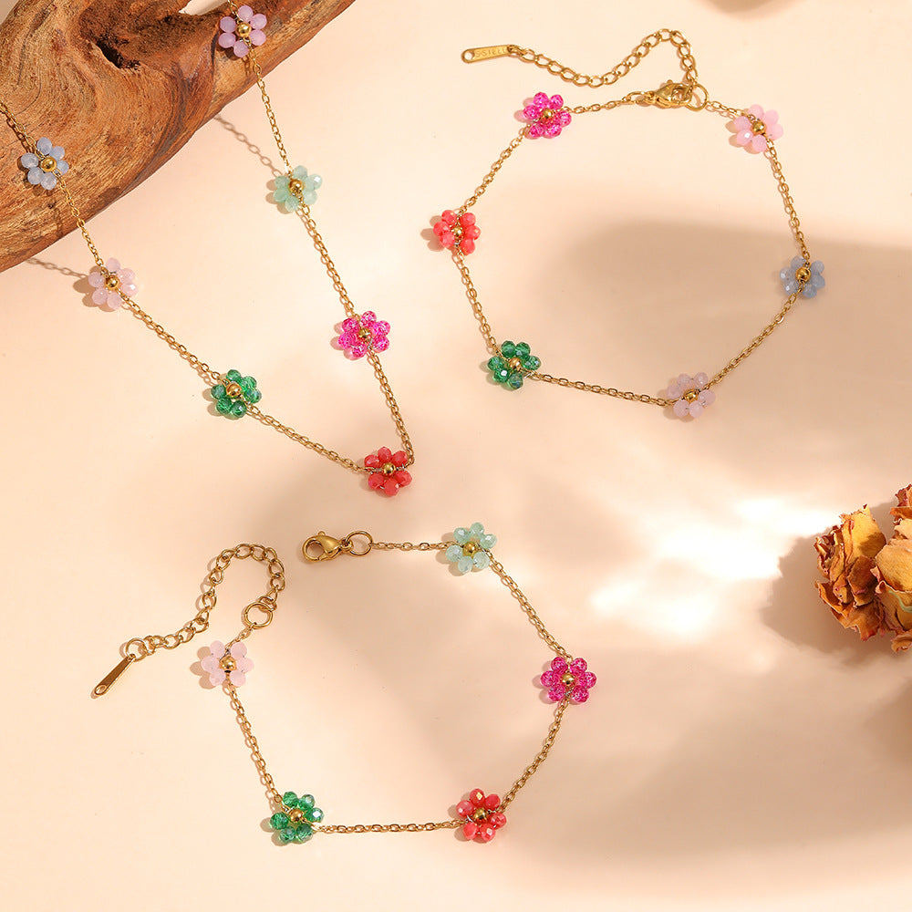 Jolie – Farbenfrohe Taillenkette mit Blumen-Akzenten